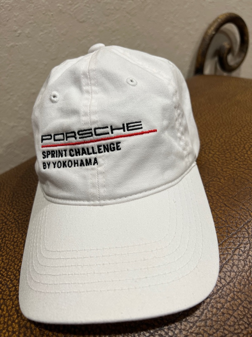 Porsche Design Sprint Challenge Yokohama White Cap with Black & Red Embroidery!
